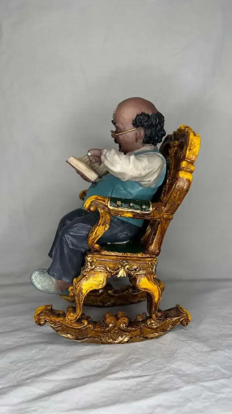 Vintage American Elderly Grandfather Reading a Book in Rocking Chair Figurine